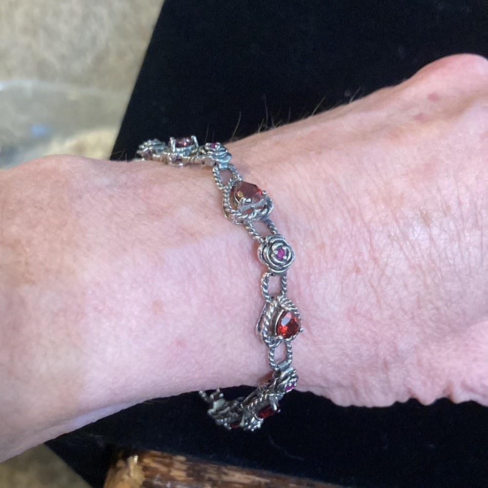 Gorgeous Sterling silver bracelet surrounded by lab created rubies and garnets - Picture 3 of 7